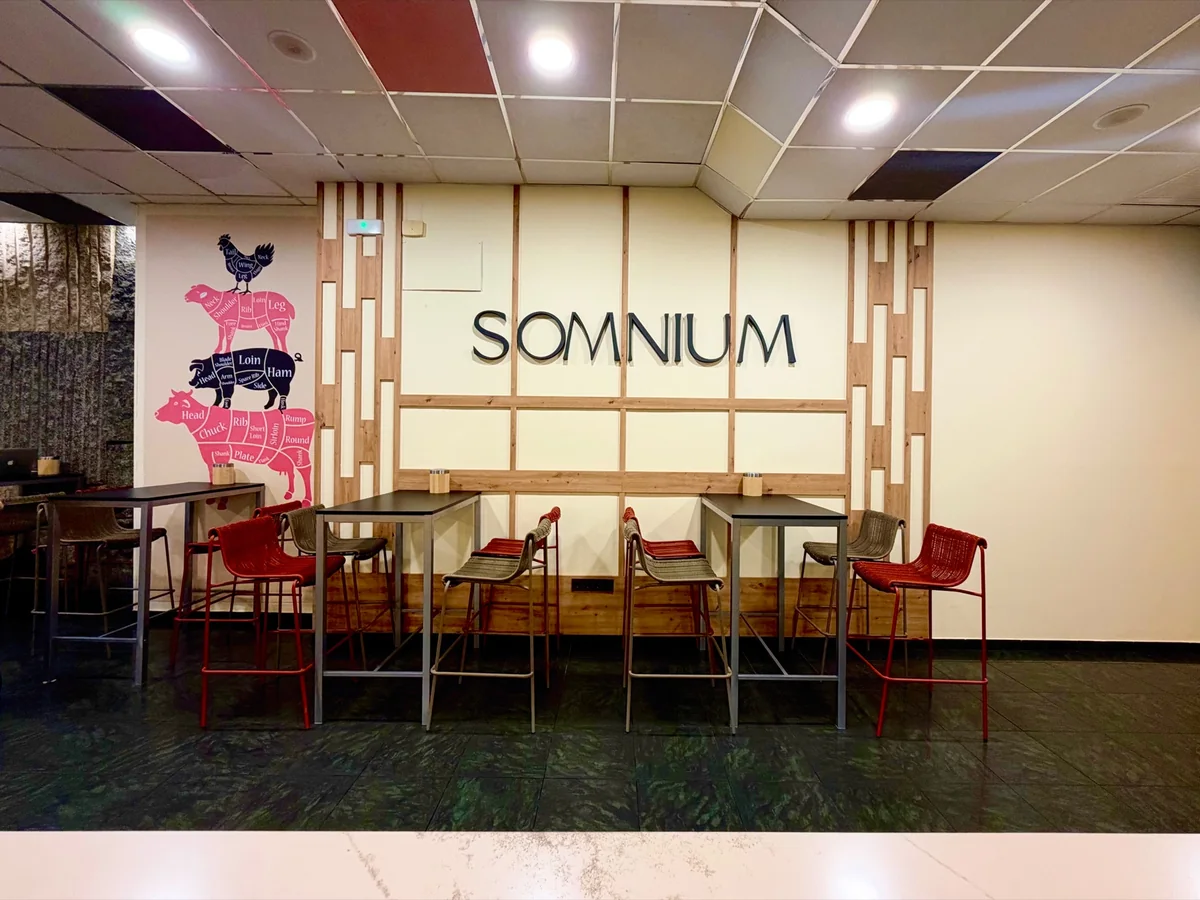 Somnium’s Gastro-Bar, with the restaurant’s name on the wall